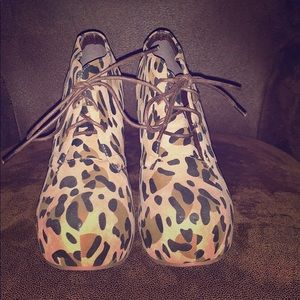 Eye Candy Cheetah print lace up wedges. Size 9